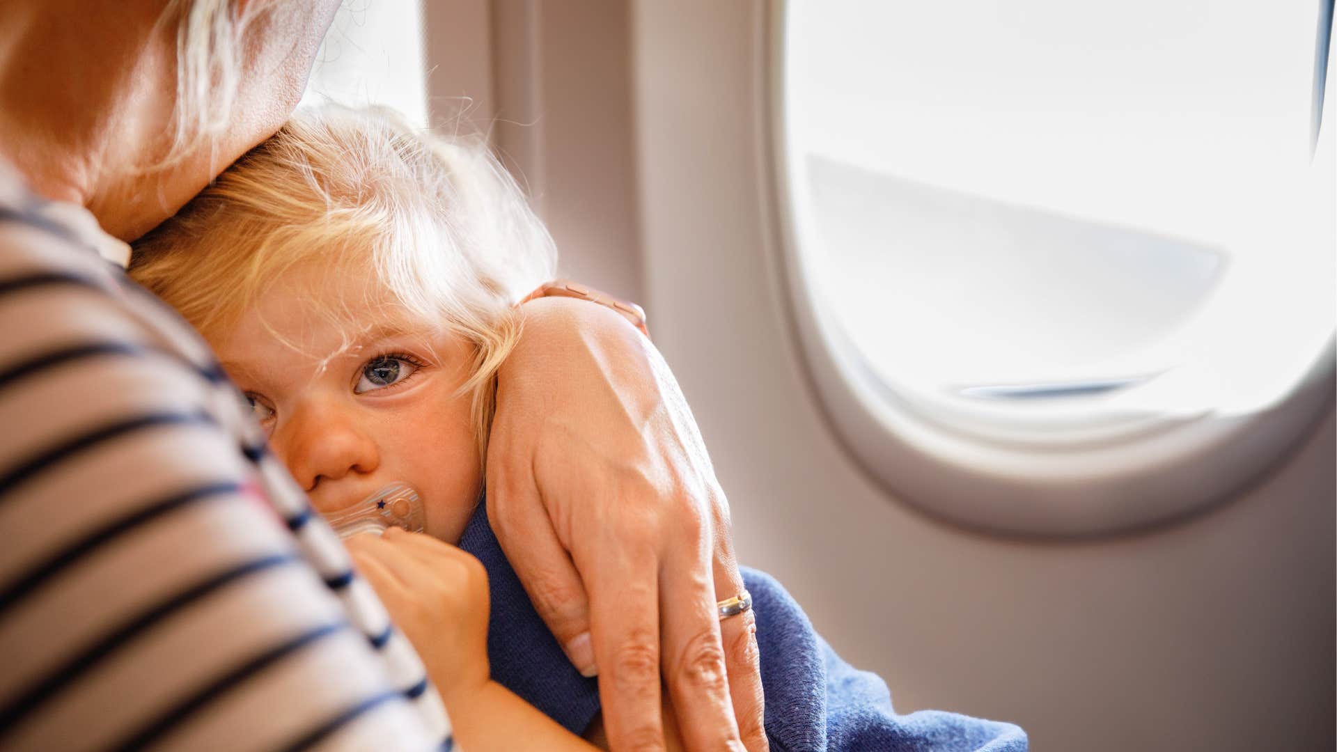 Child, mothers, arms, airplane