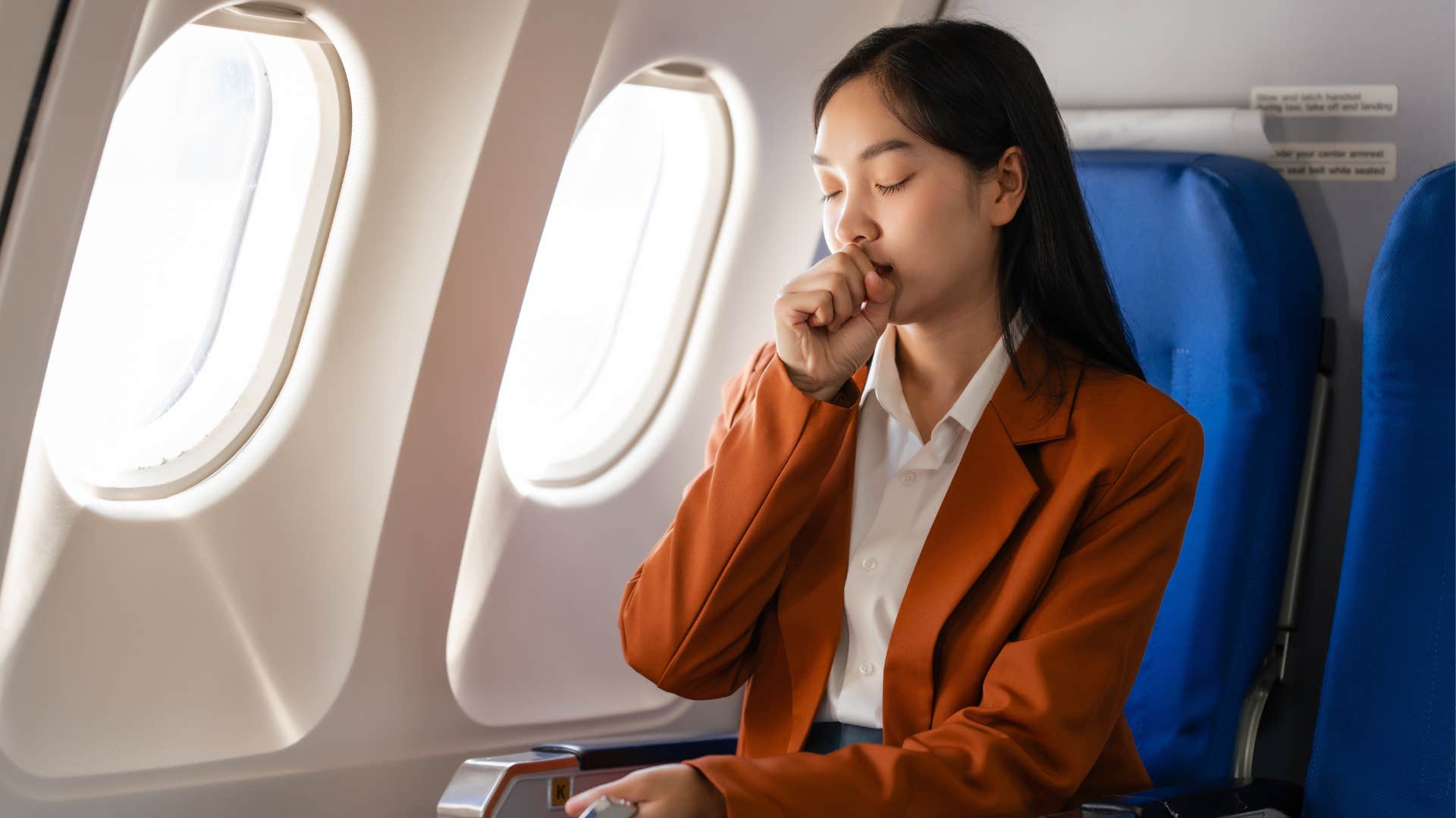 Woman, ill, airplane