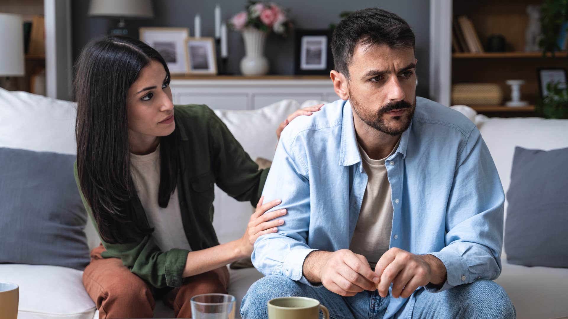 Woman comforting her upset partner.