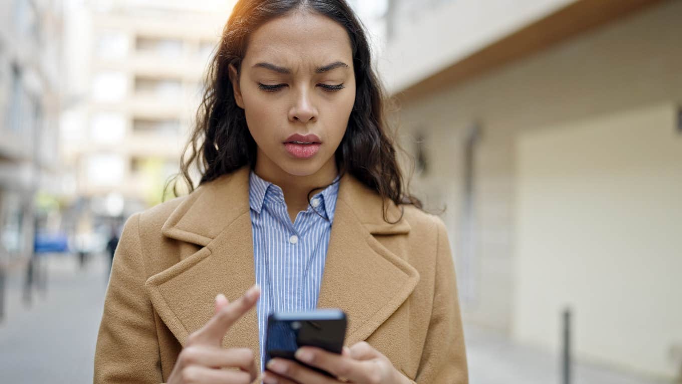 Woman on her phone concerned about her data privacy