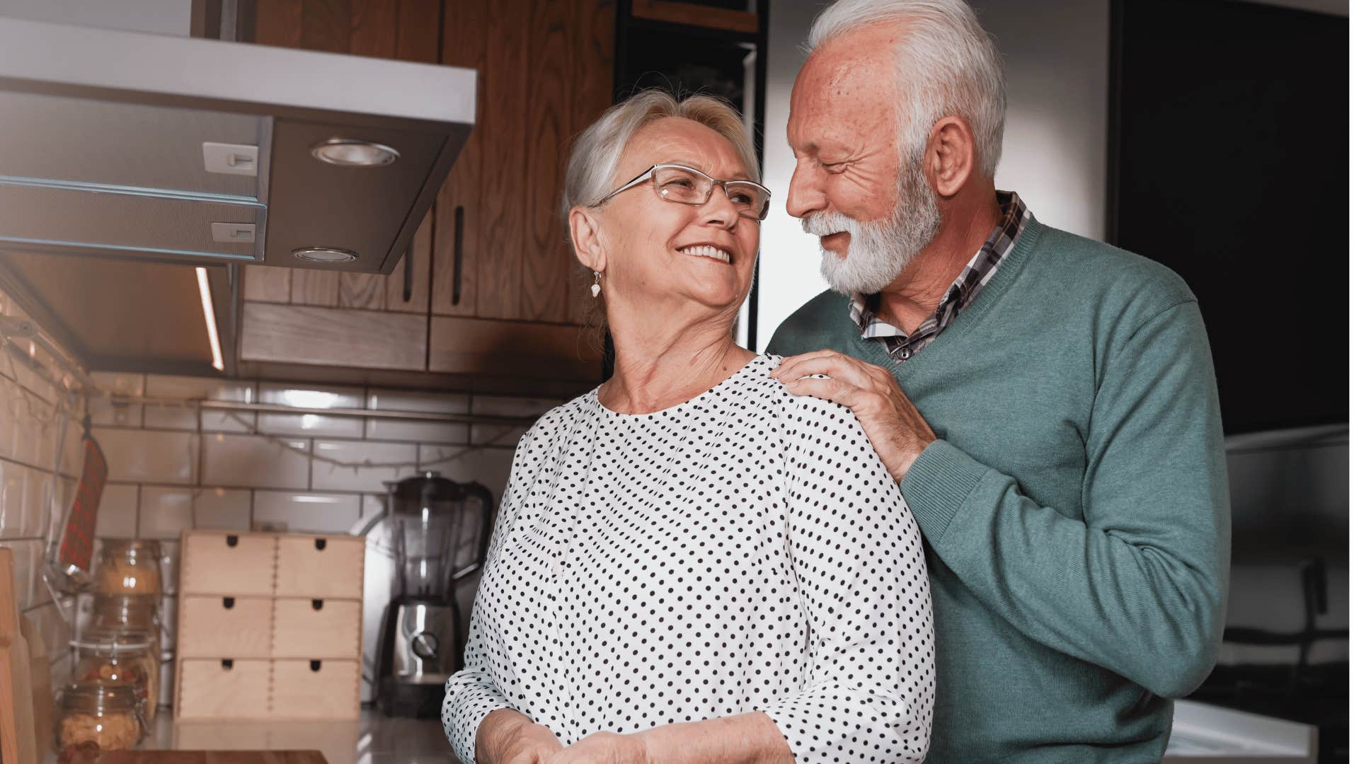 Loving couple in kitchen