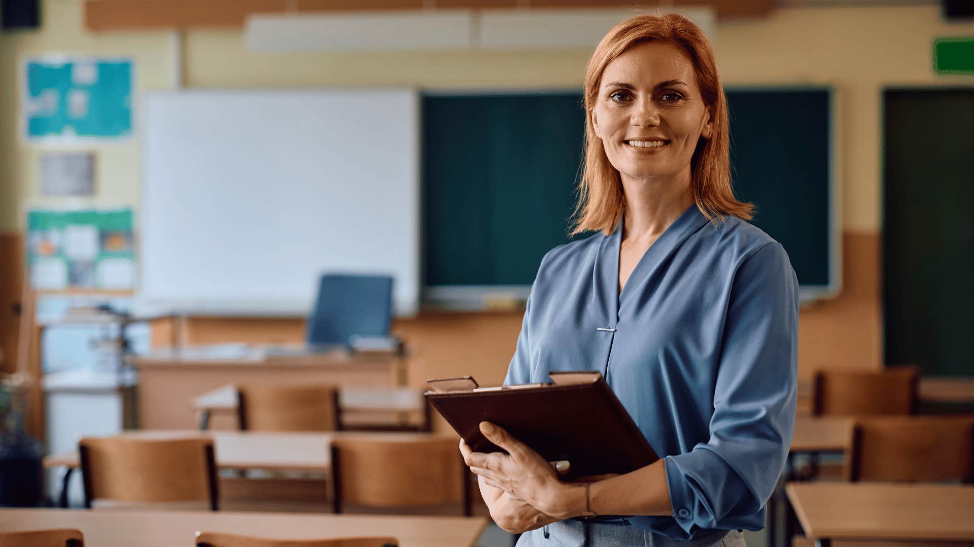 teacher smiling at camera