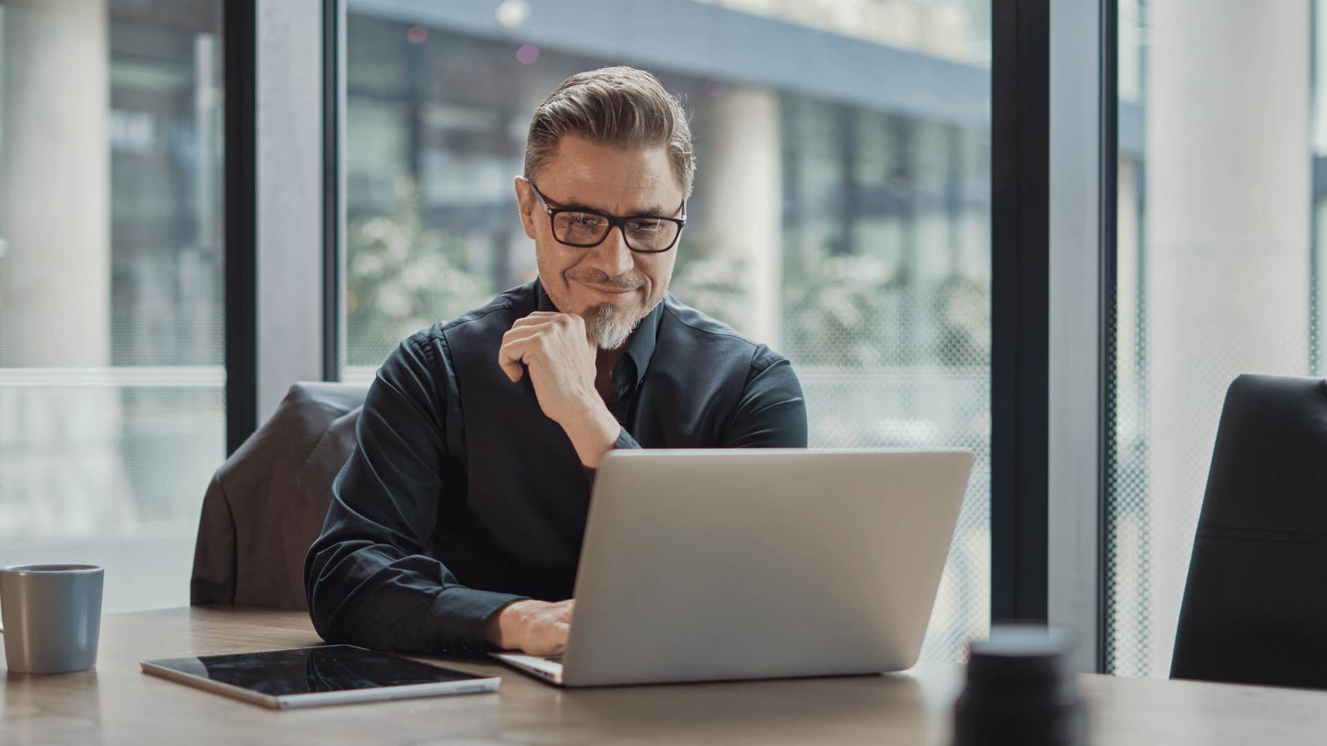 man working on laptop