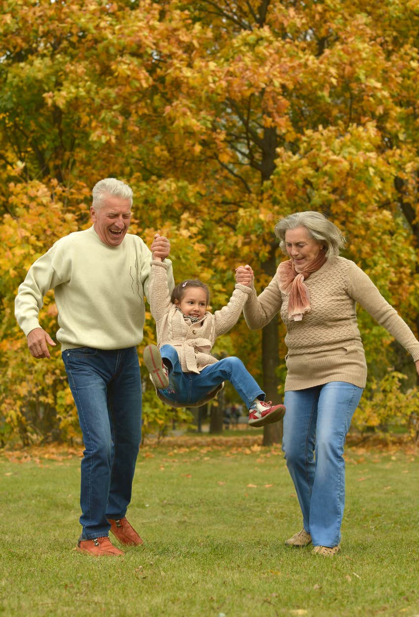 grandparents with granddaughter