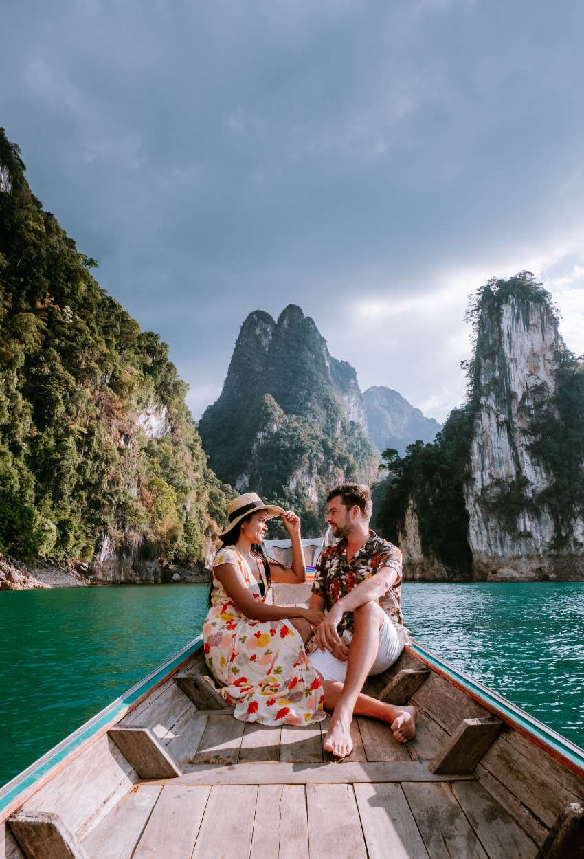 Couple experiencing amazing vacation boat ride