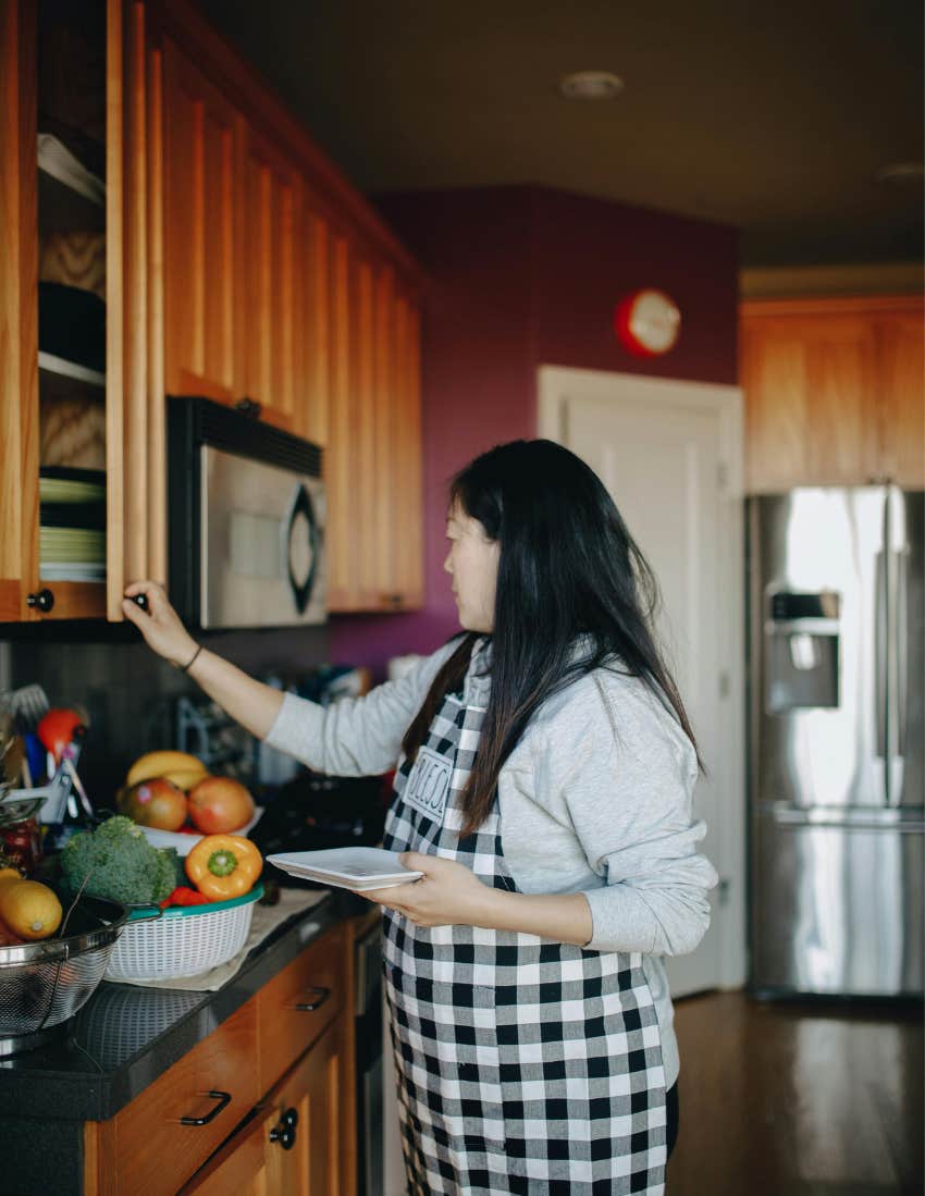 Woman, pregnant, kitchen, cabinet