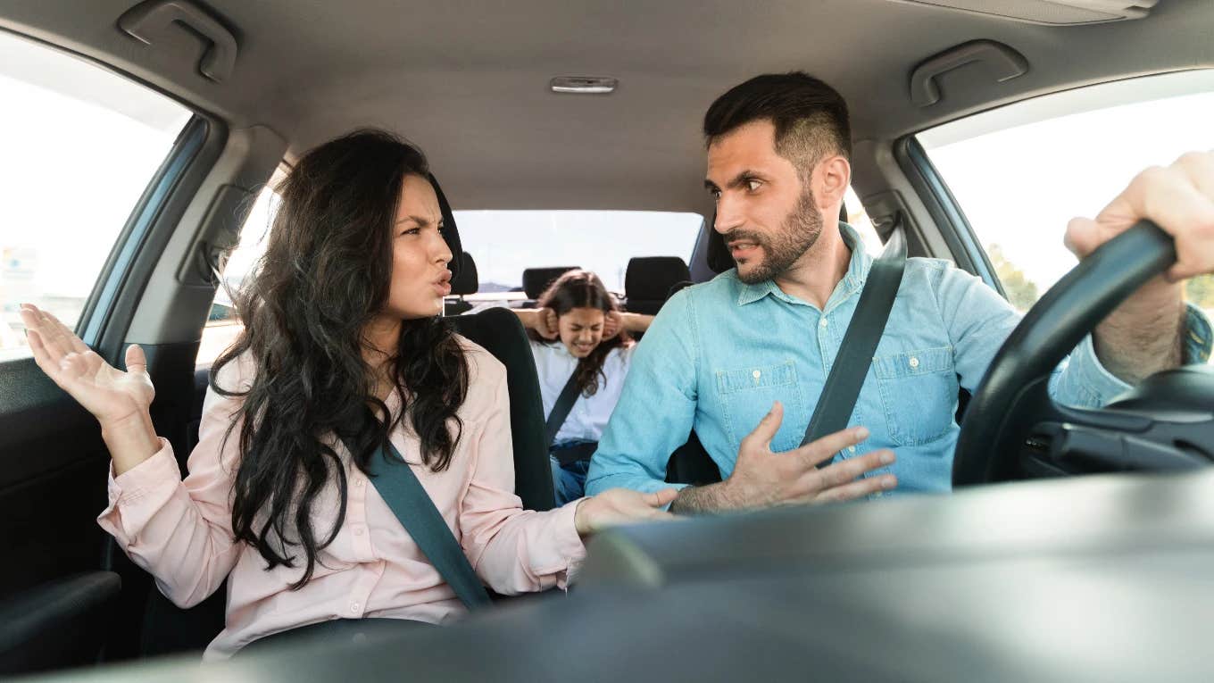 Husband and wife having argument in car about the gas