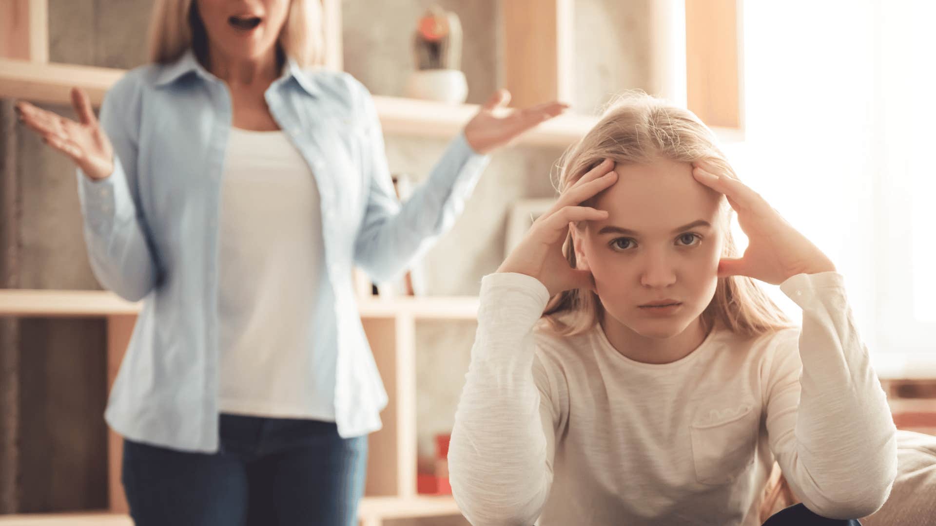 angry parent ignoring child's achievements