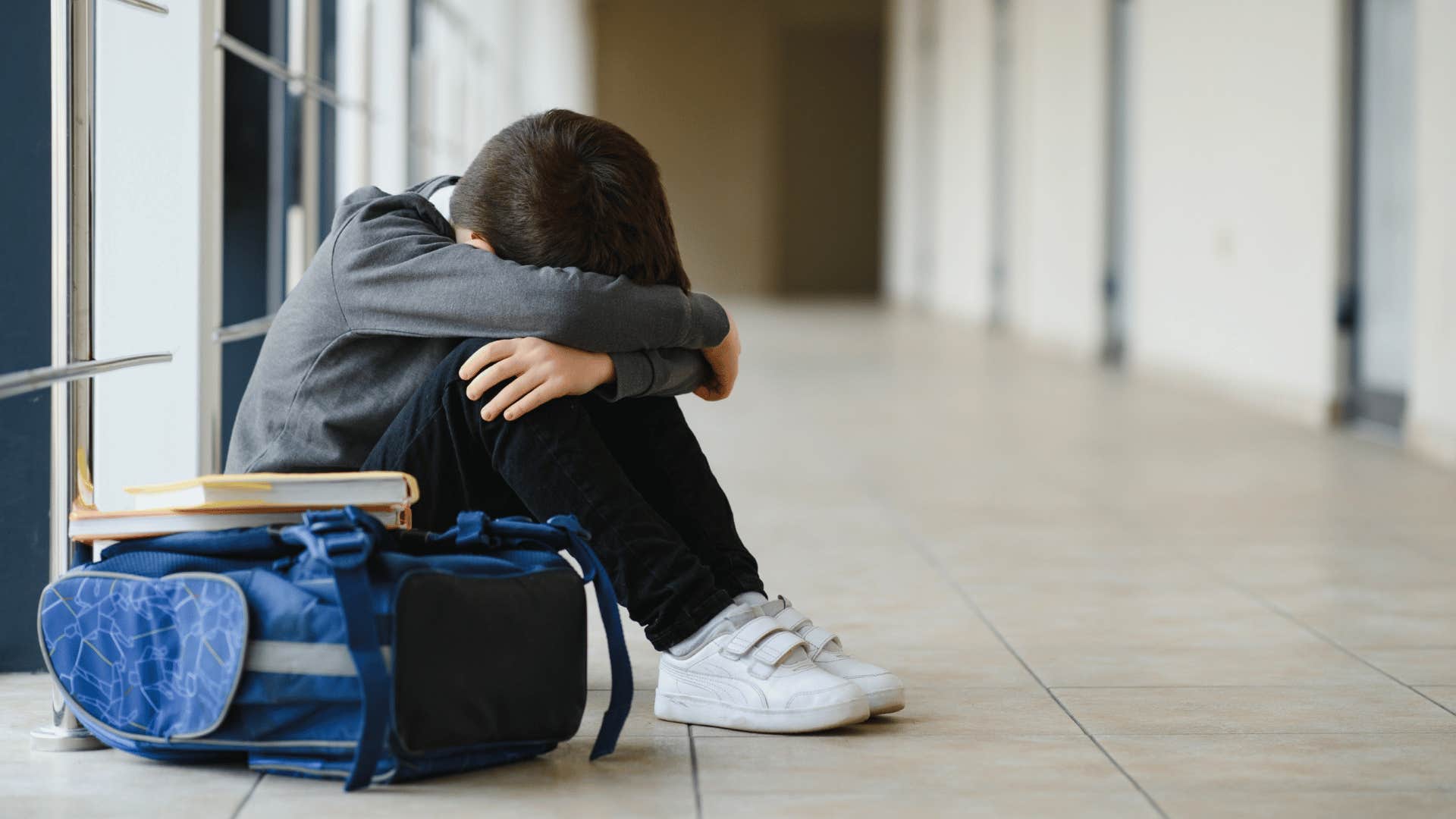 little boy crying from being bullied