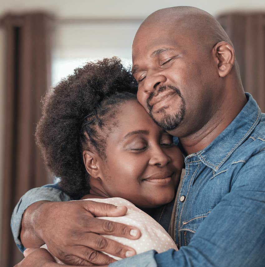 Loving couple embrace comfortably