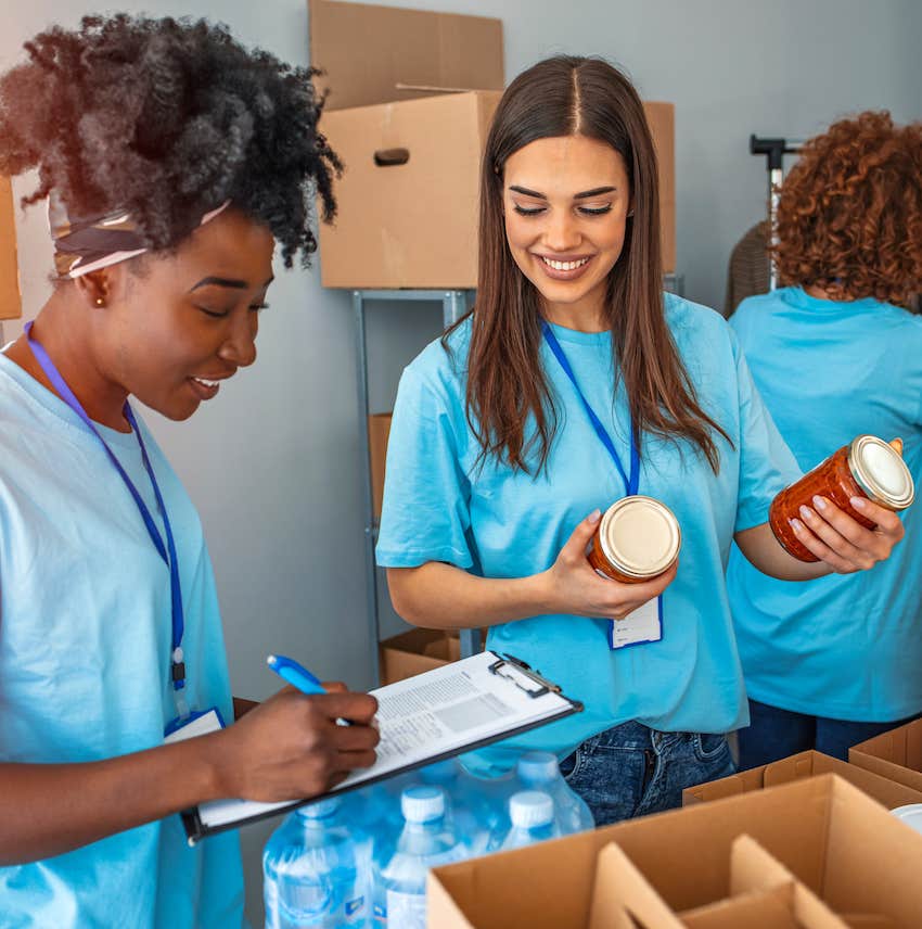 People volunteering at food service