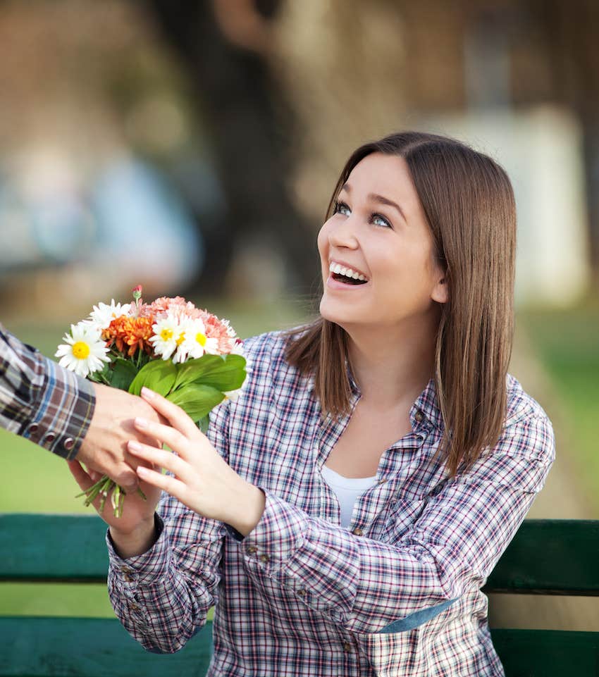 Happy women receives flowers