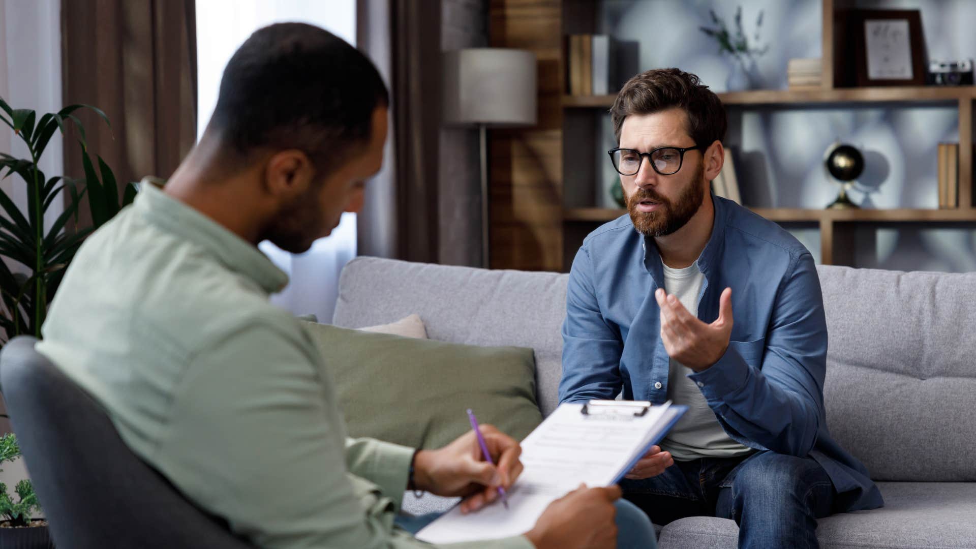 emotionally man talking to therapist