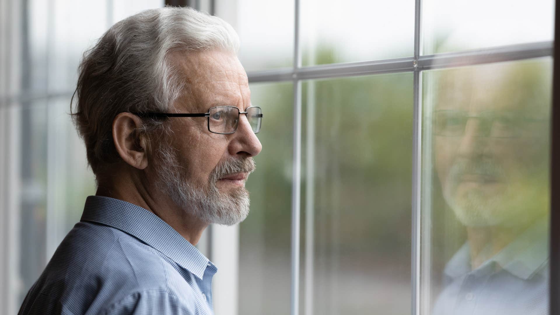 humble older man looking pensive