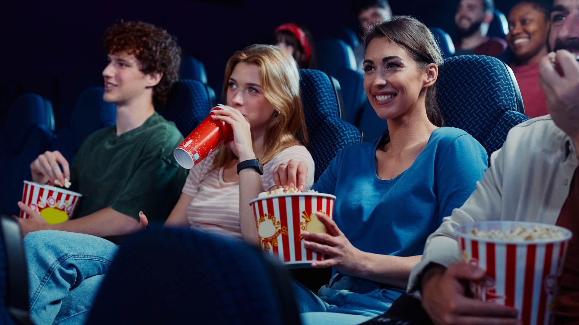 young people in movie theater