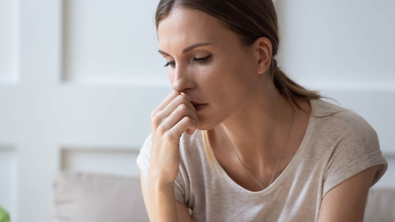 worried woman sitting and thinking