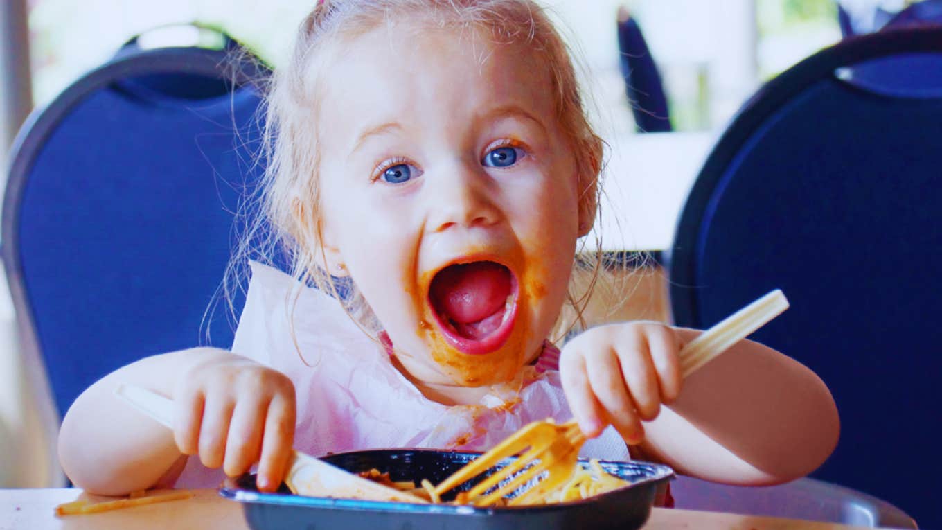 little girl at restaurant 