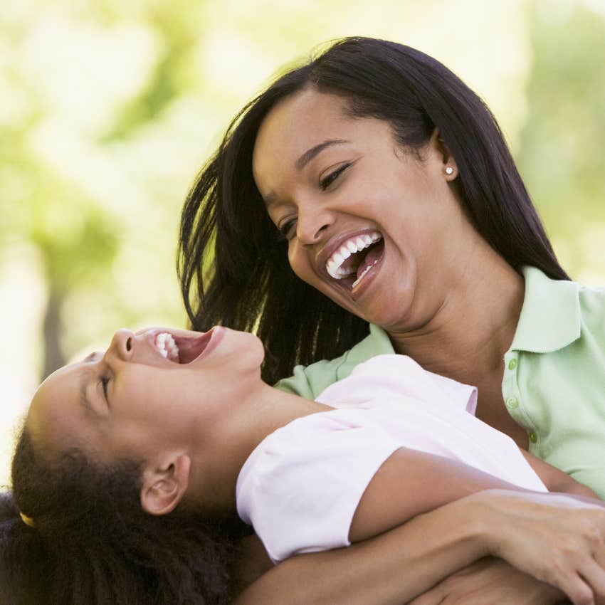 Mom and daughter laughing