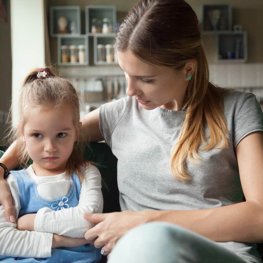 Mom helping her daughter name her emotions