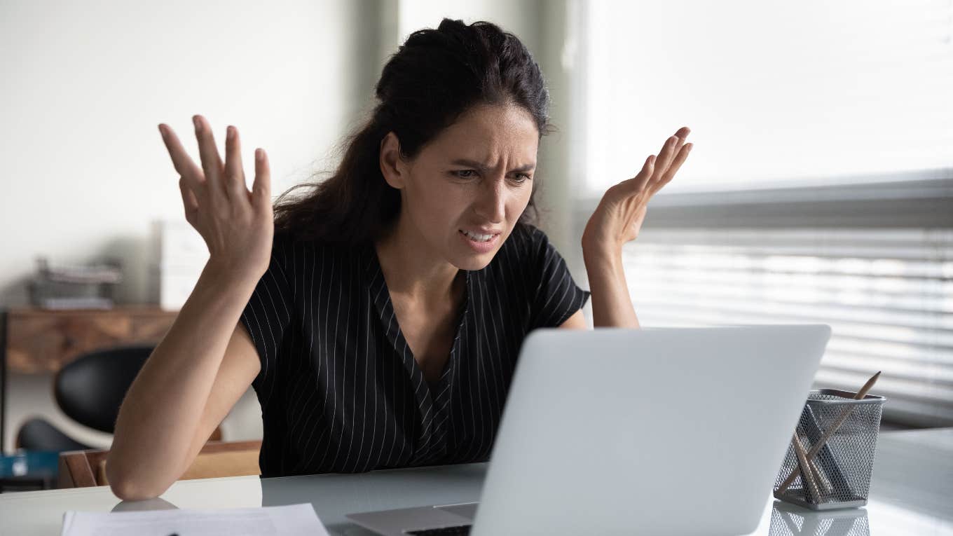 confused, upset woman looking at computer