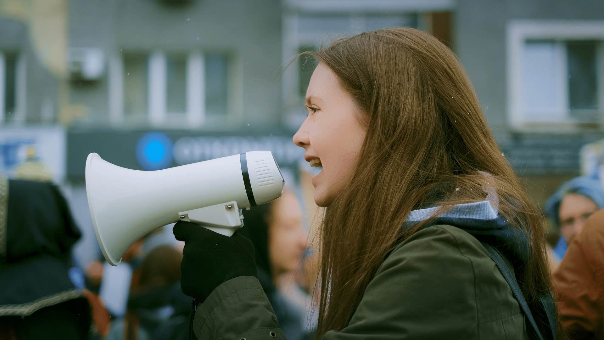 woman speaking with megaphone