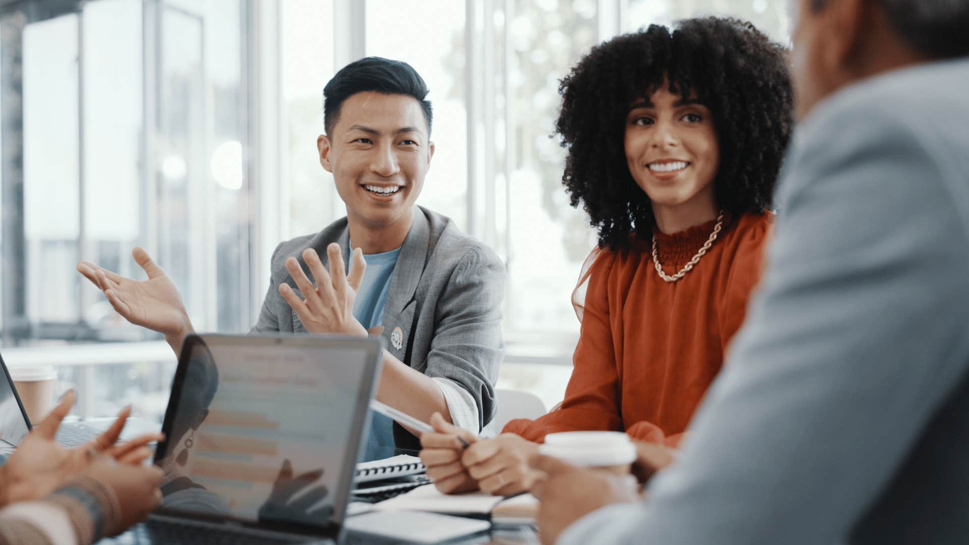 group of people talking in a meeting