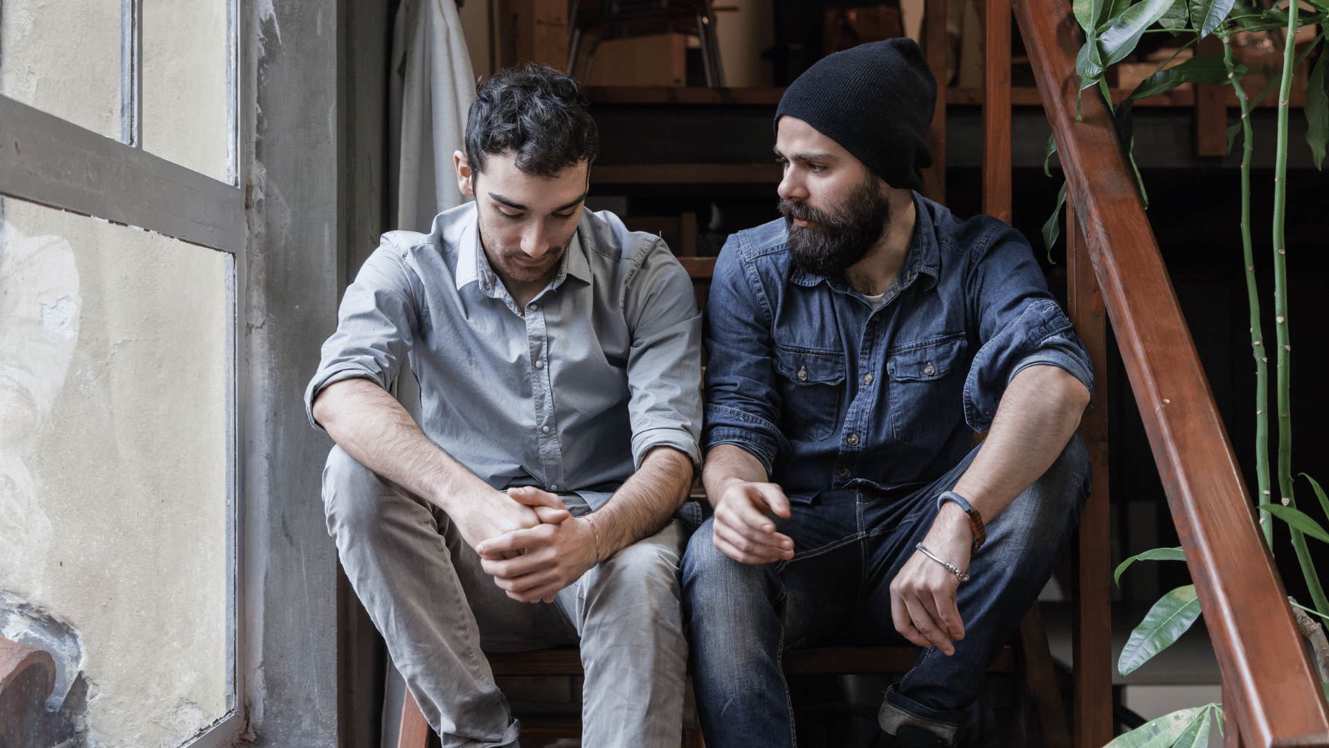 man staring at other man to detect lies