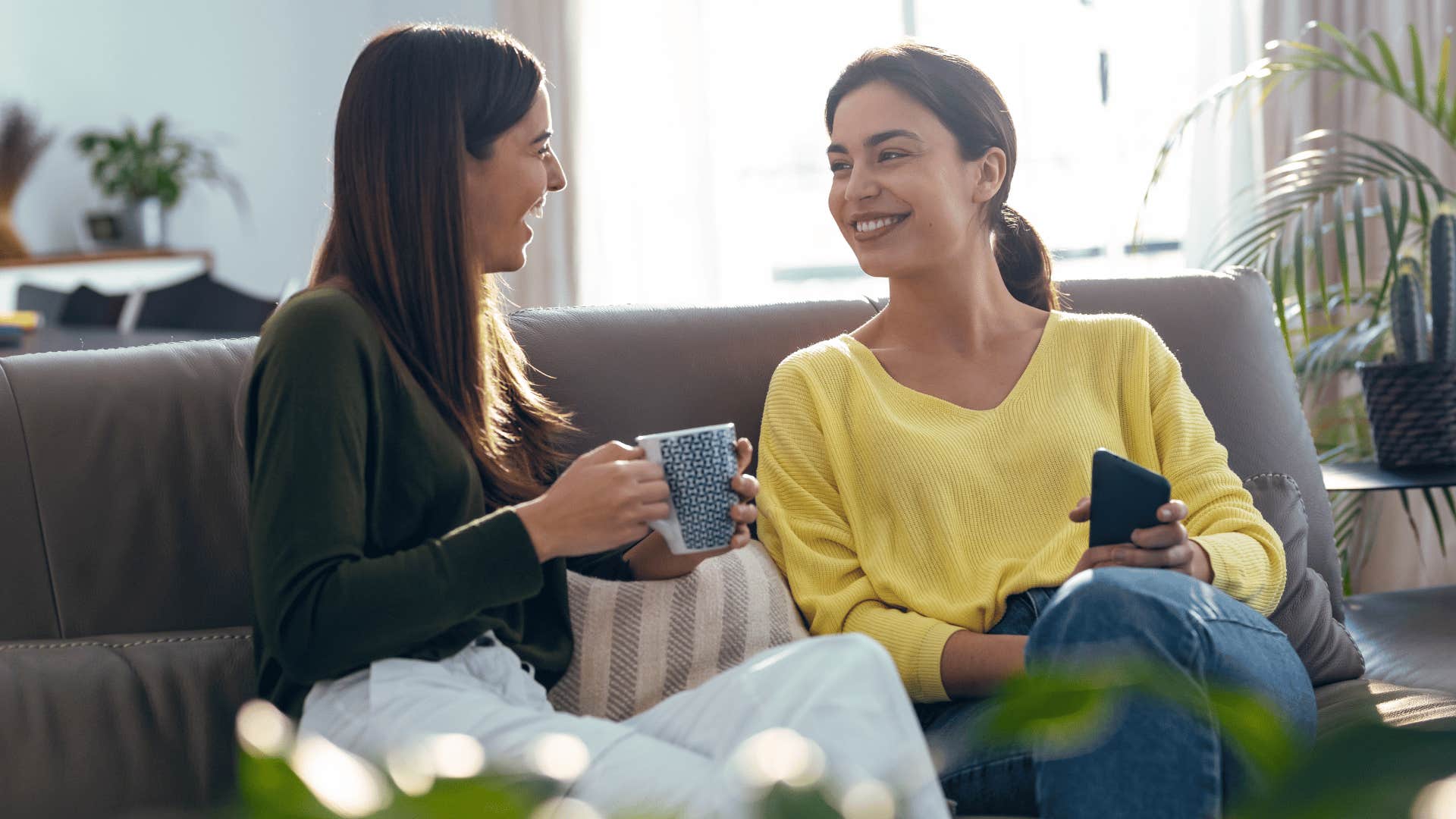 woman over-explaining herself over coffee