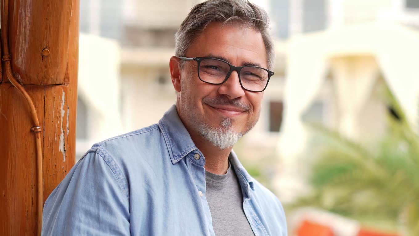 intelligent man with glasses smiling