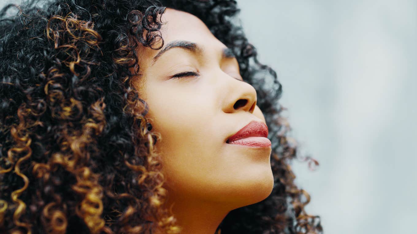 Woman in middle of spiritual awakening. 