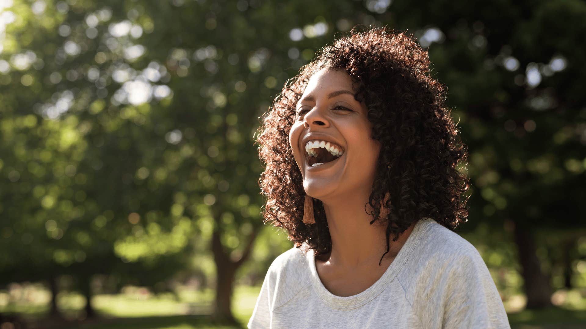 woman smiling outside