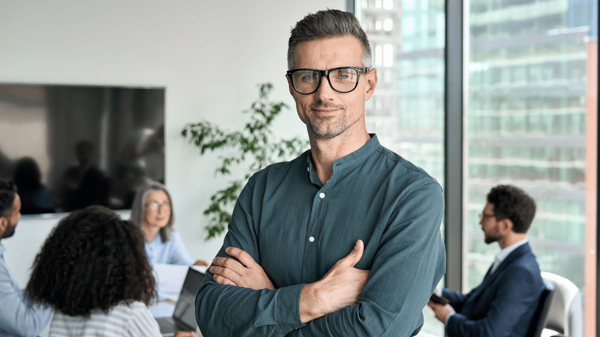 man crossing arms looking at the camera