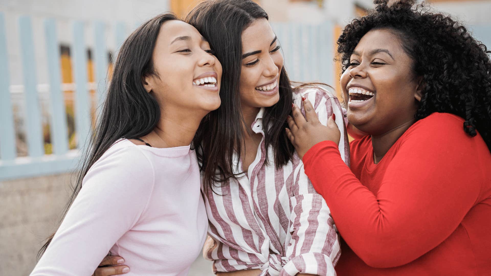 three best friends smiling and laughing