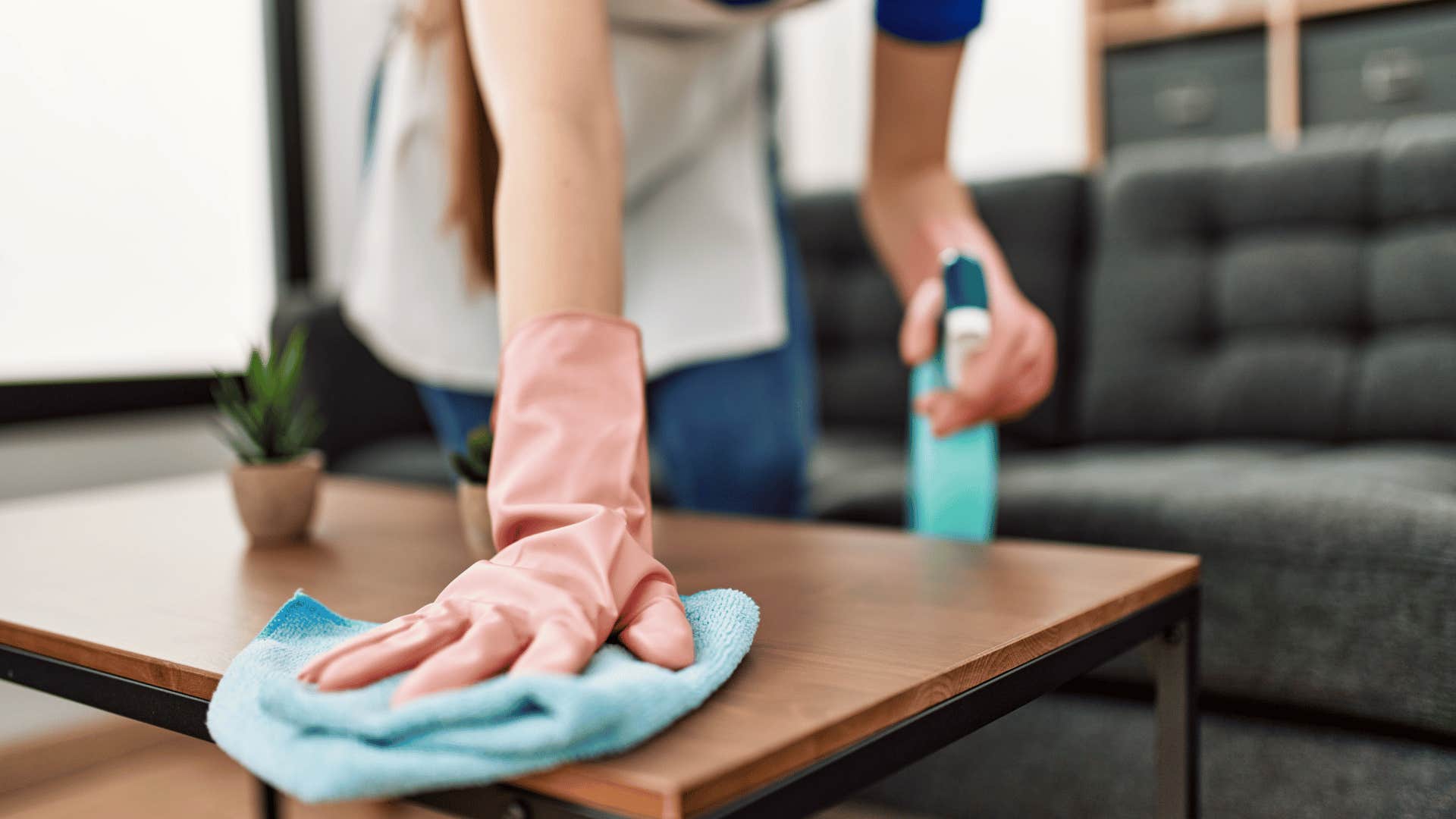 person cleaning room