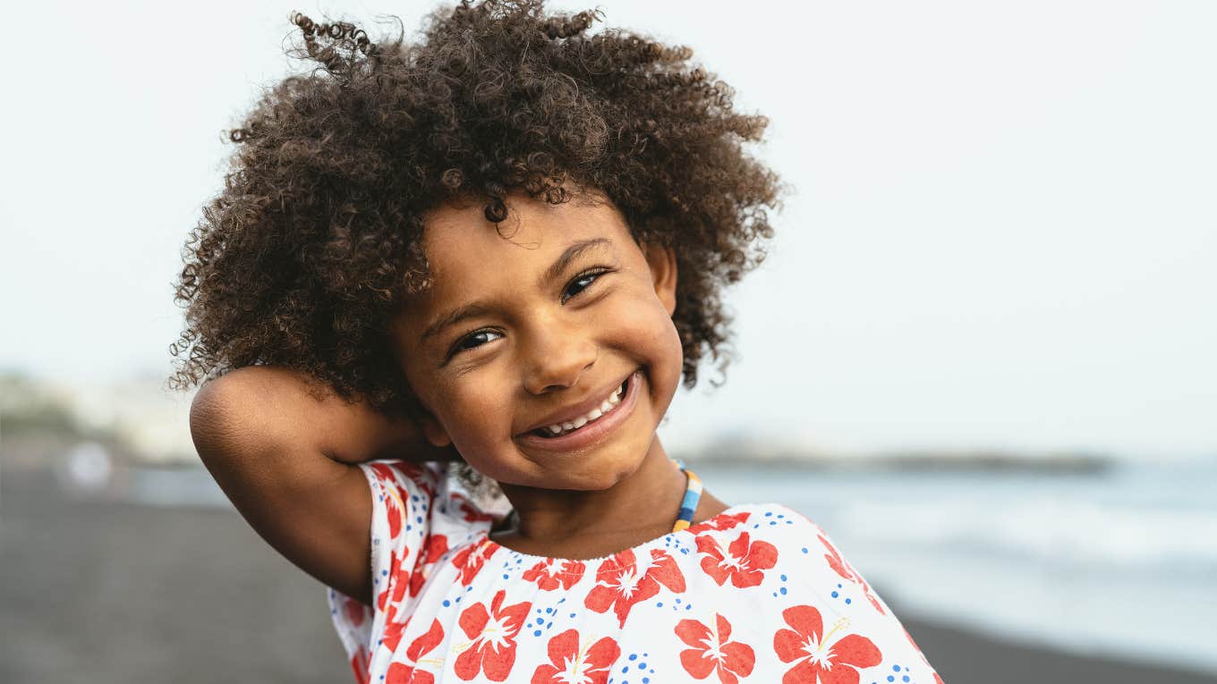 Confident smiling little girl