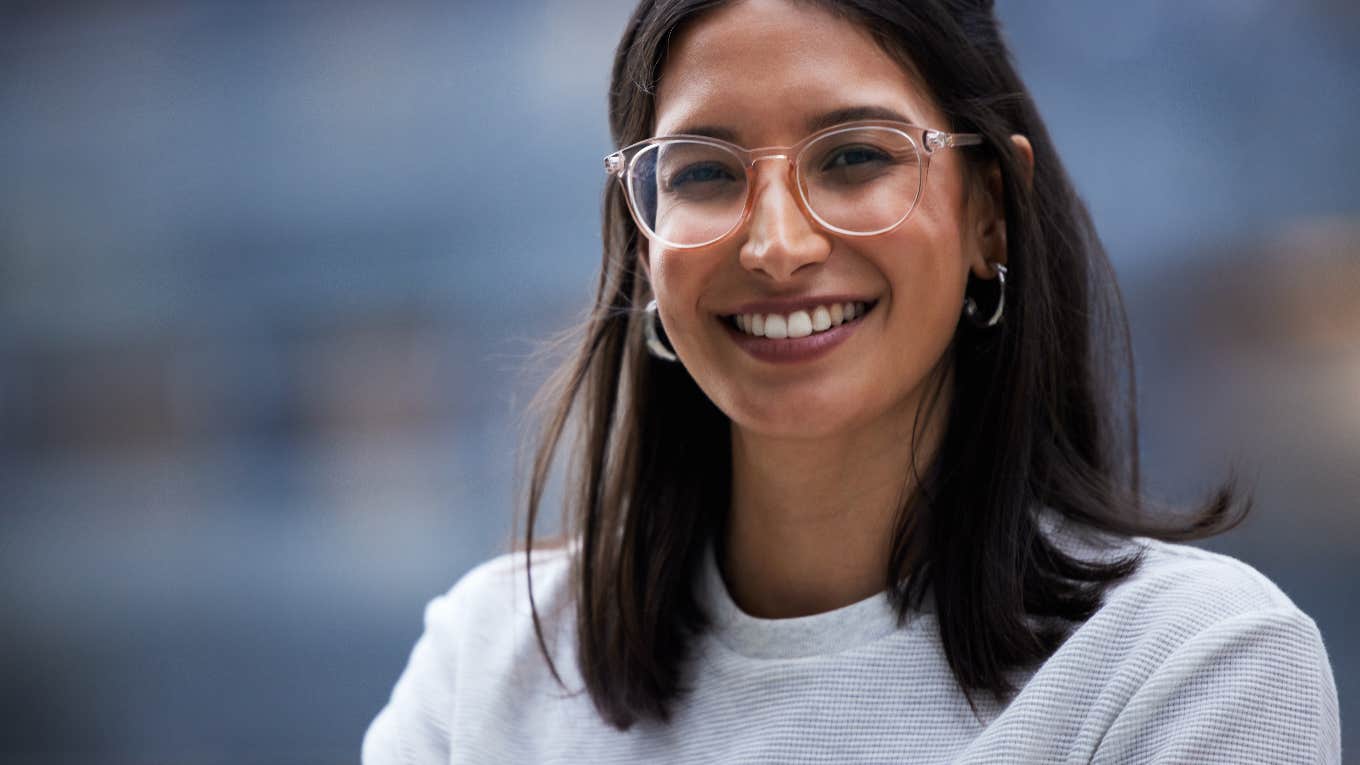 smiling, confident young woman