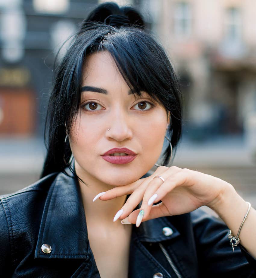 Woman looks into camera and feels seen