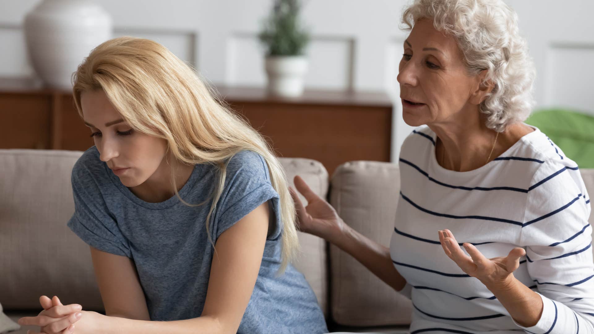 older woman defending her opinions to young woman