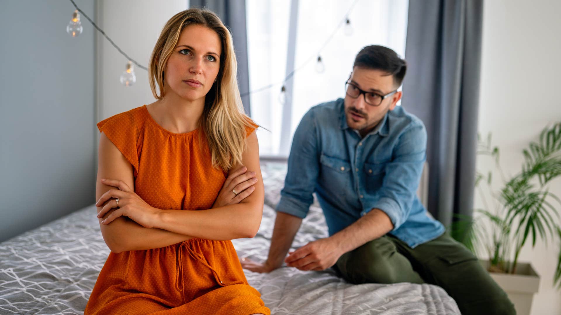 Frustrated young couple arguing and having marriage problems