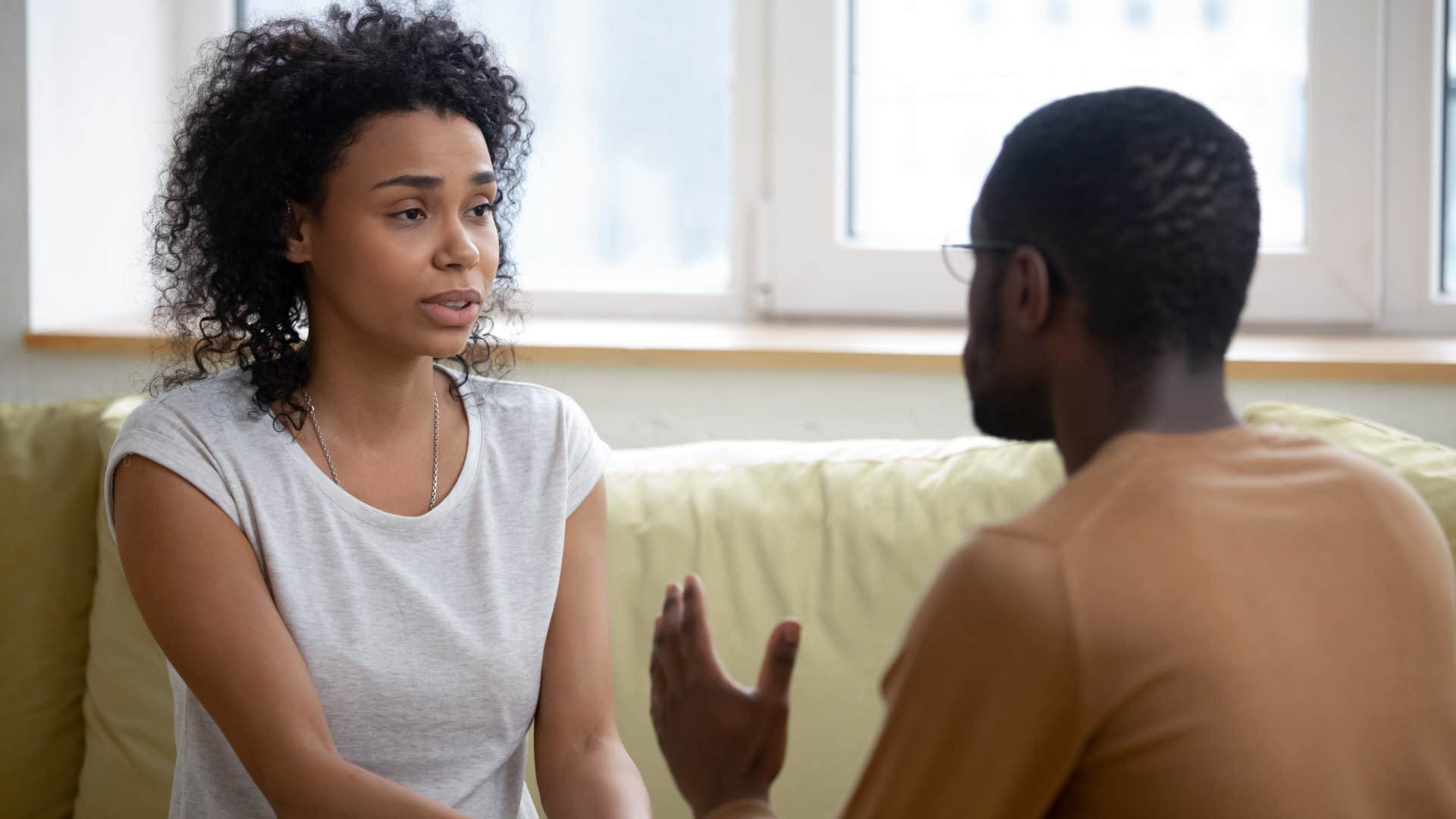 woman ending conversation with a toxic, argumentative man