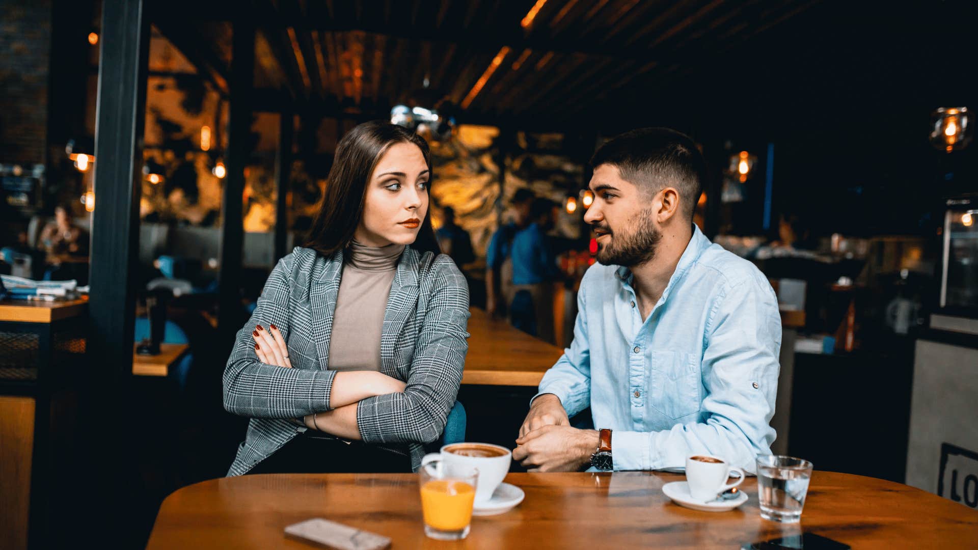 upset woman on date with man