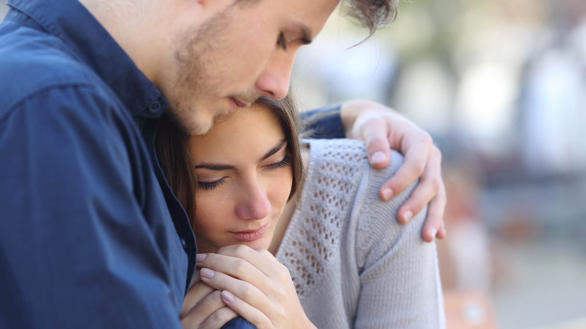 good husband comforting his wife