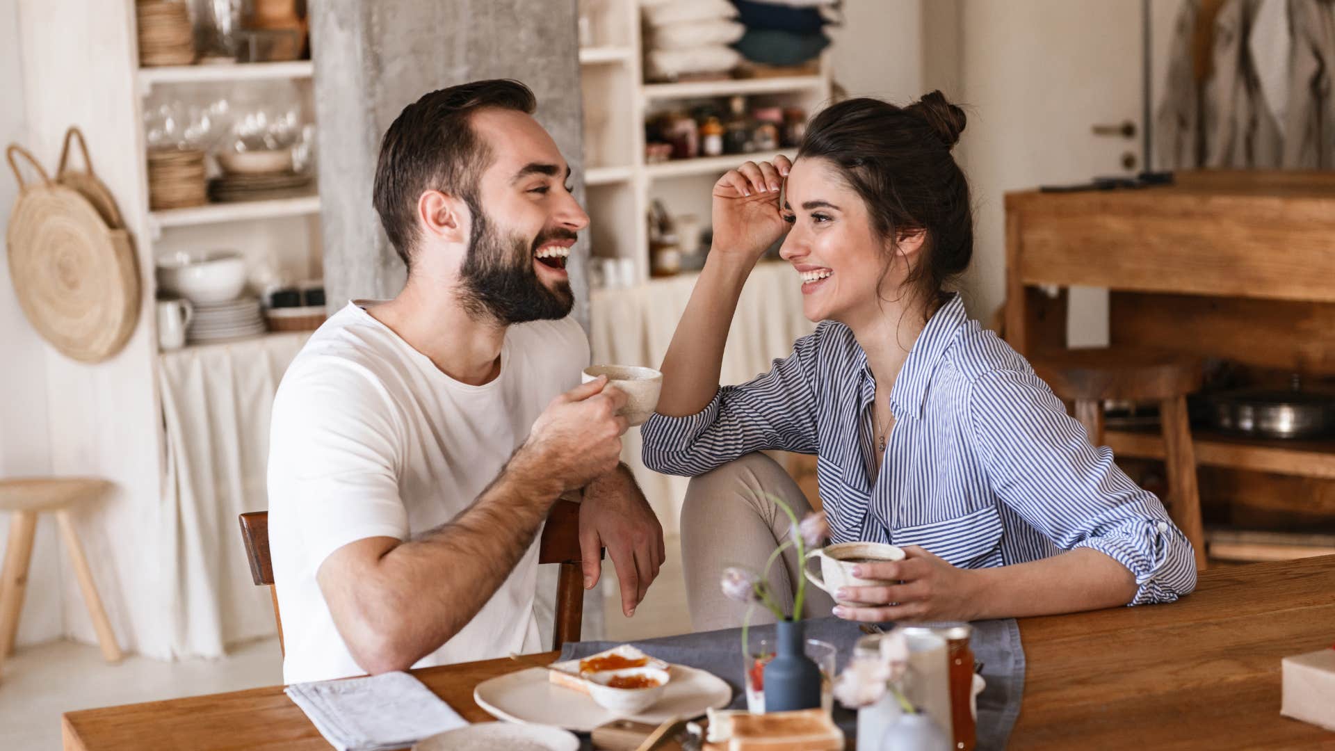 good husband enjoying breakfast with wife