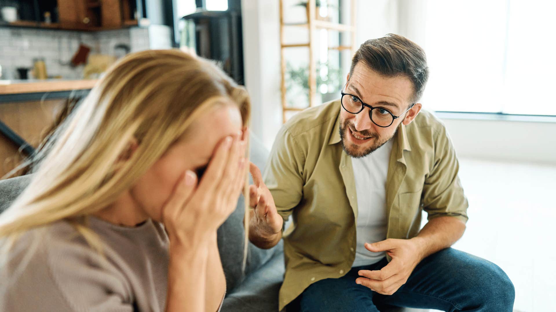 man yelling at woman