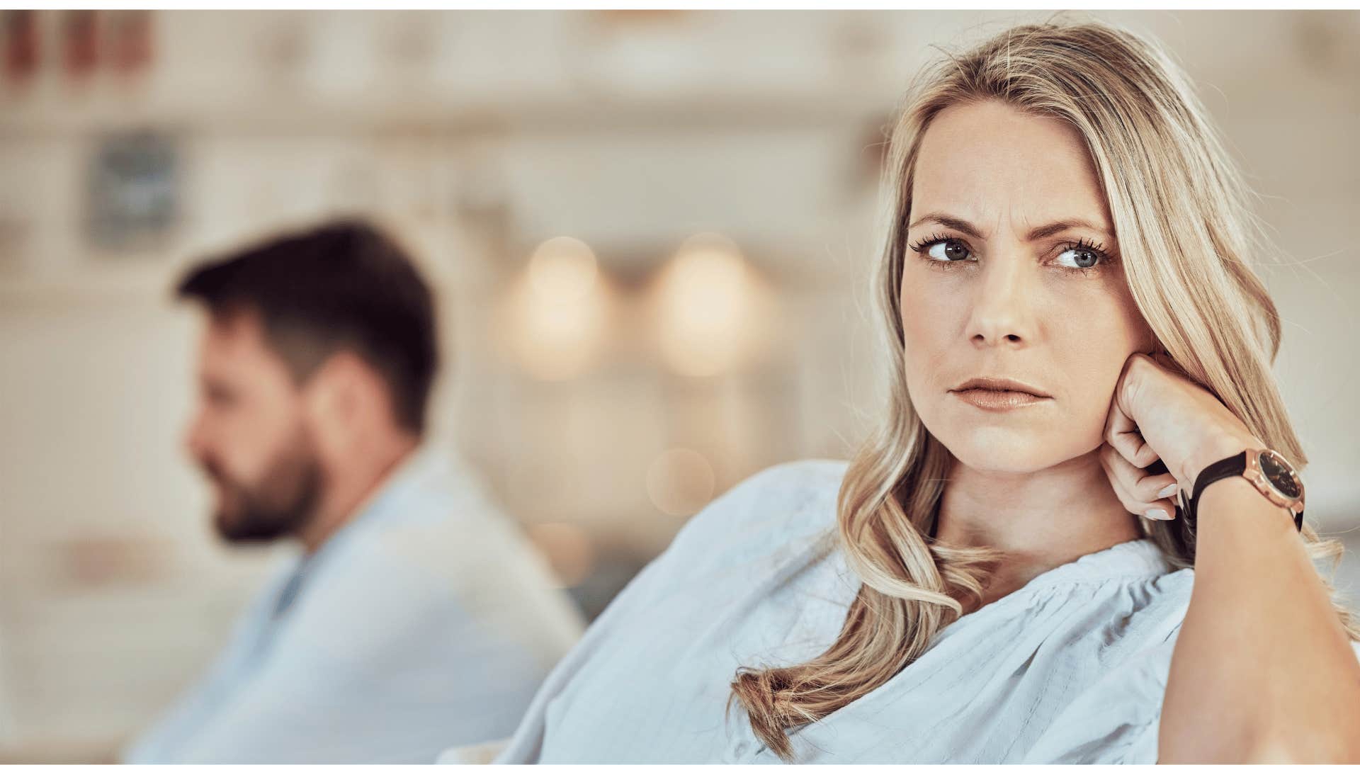 woman looking away from man upset