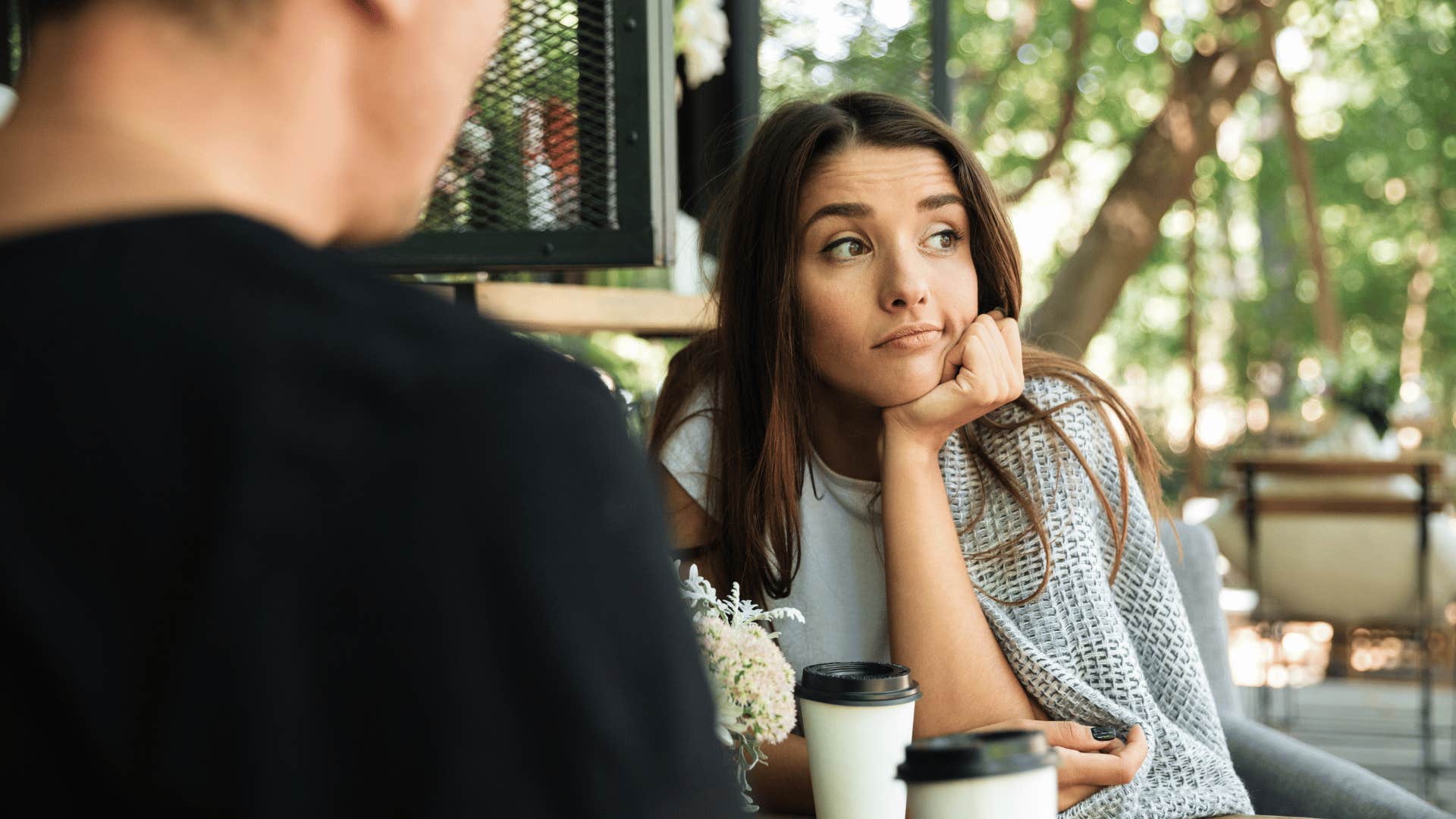 woman looking away annoyed