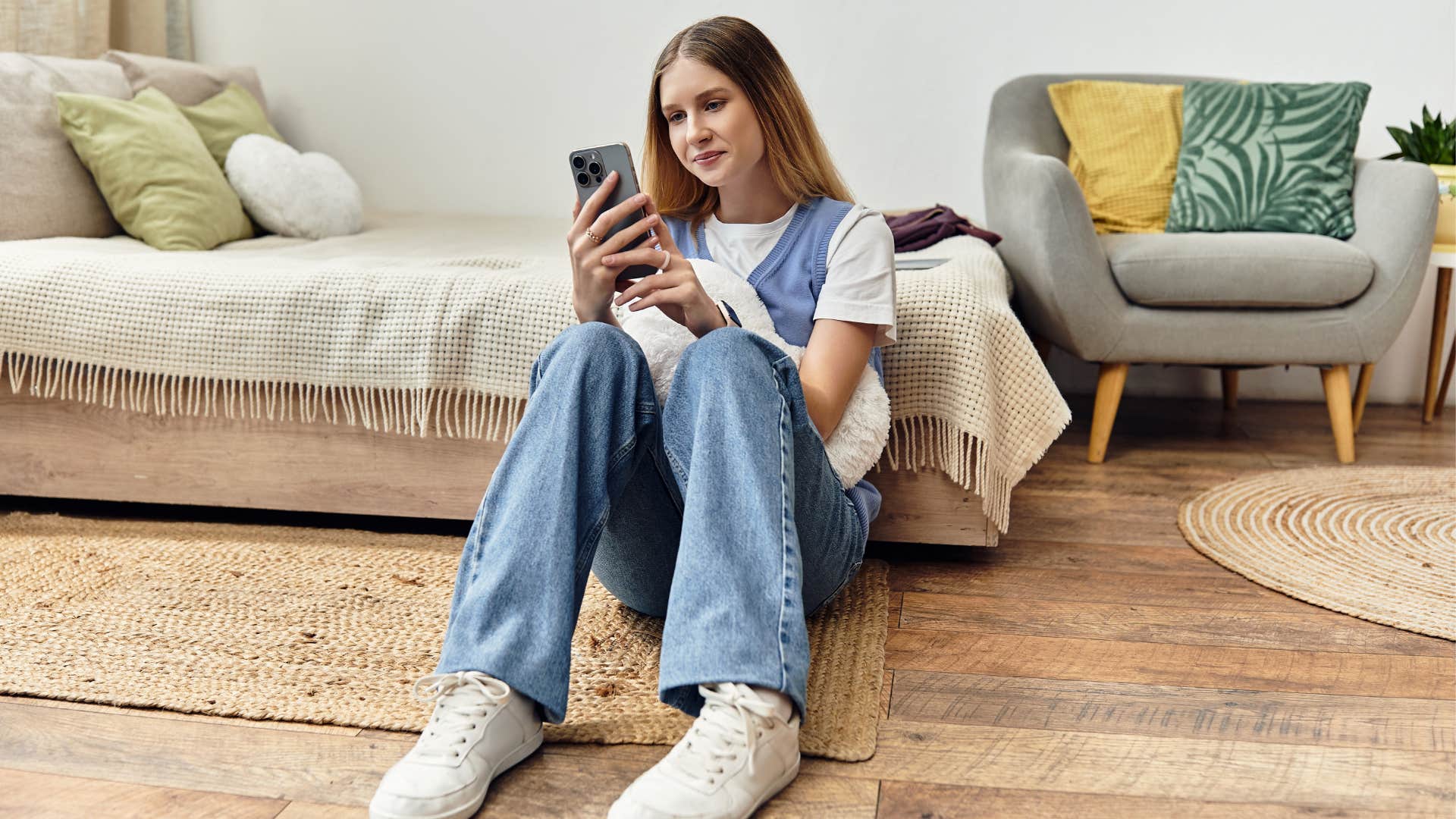 woman zoning out on her phone