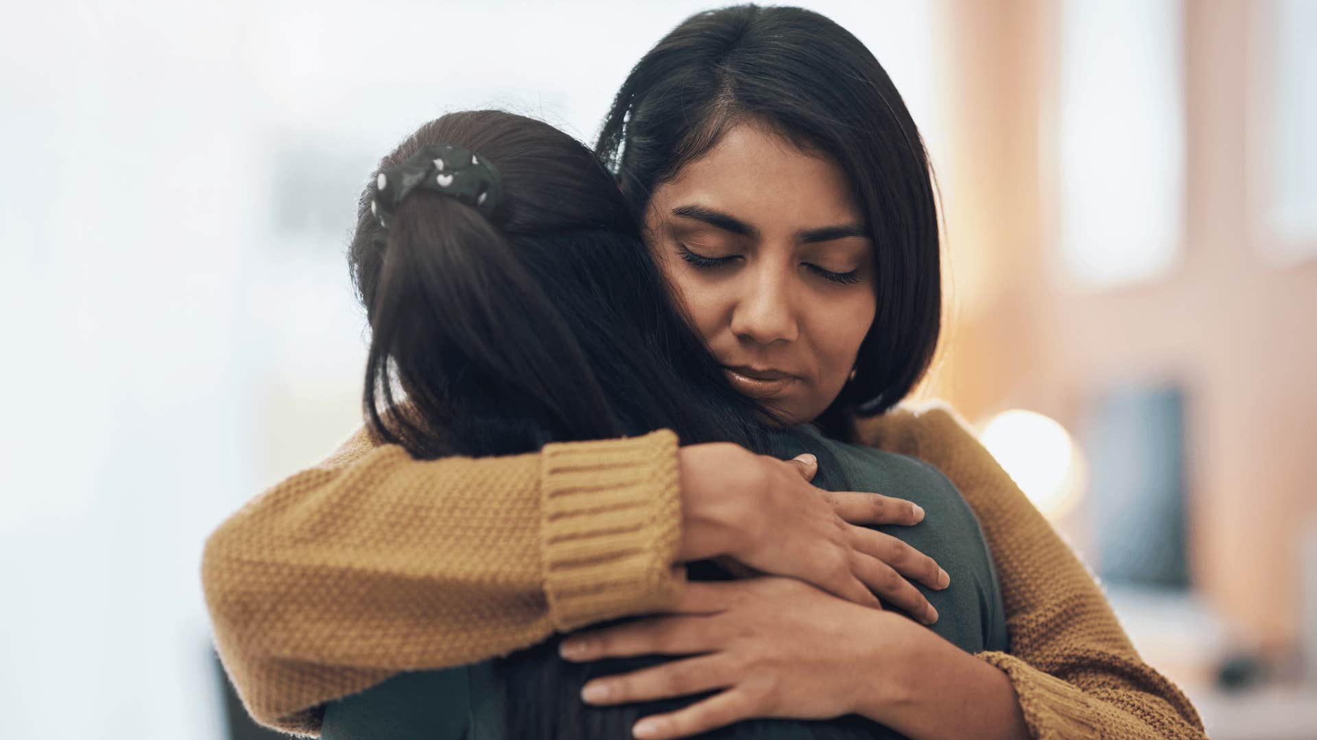 two women hugging