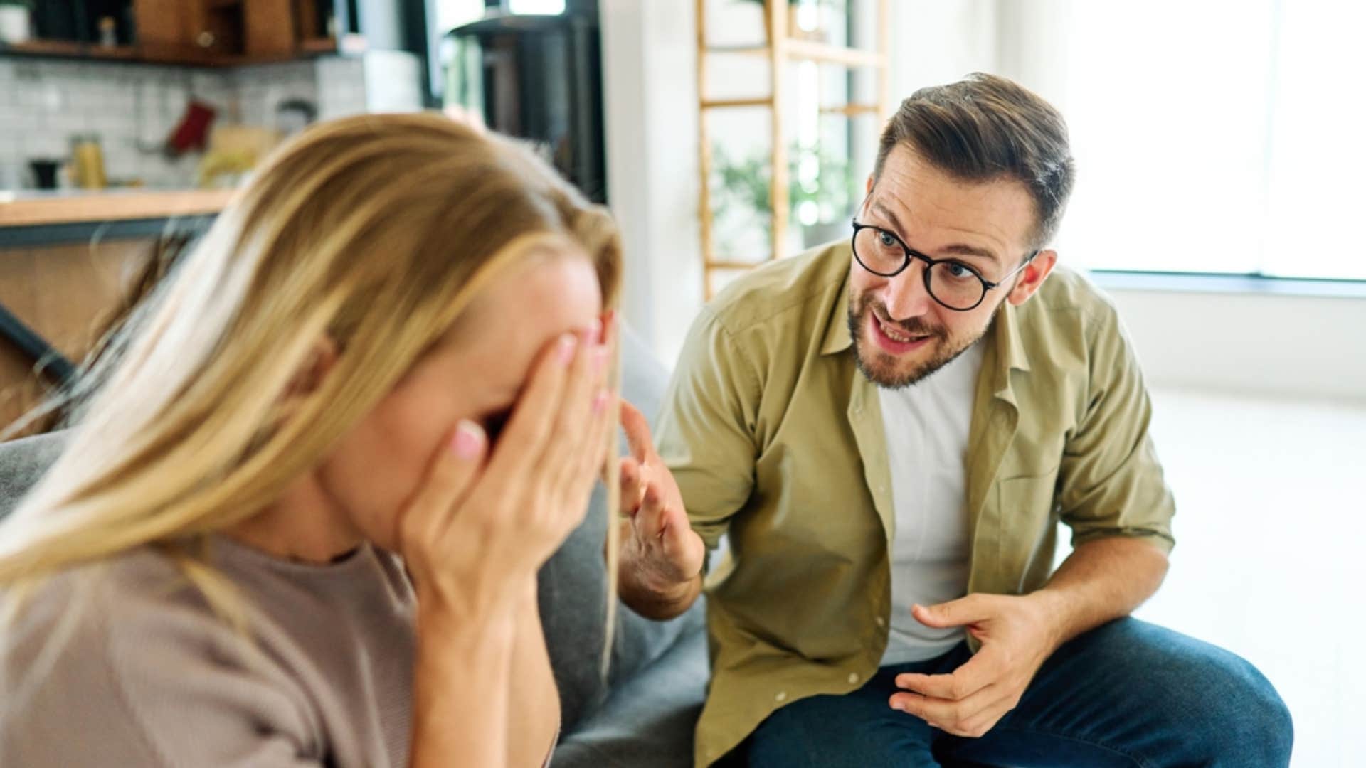 man arguing with woman