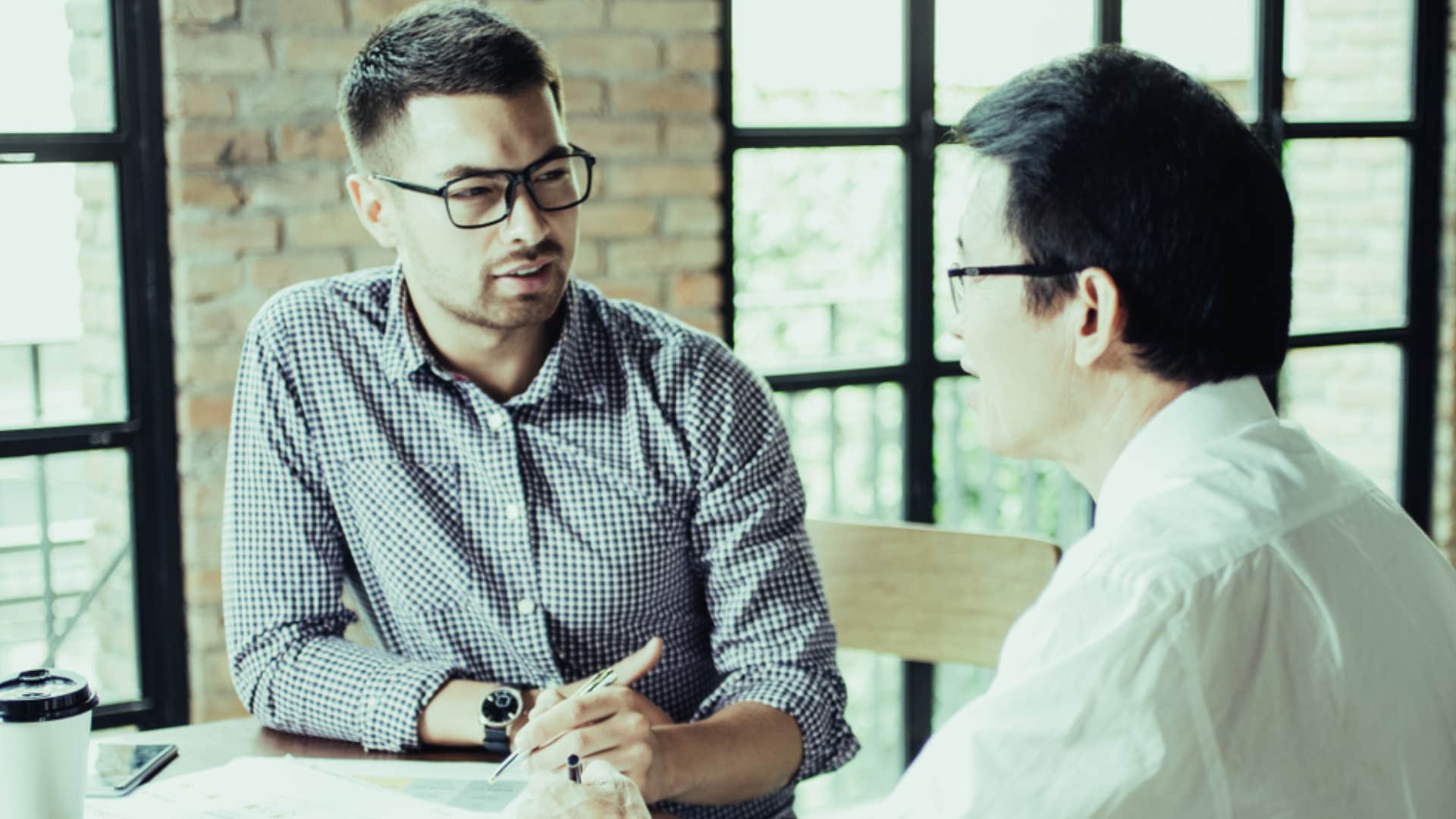 two businessmen talking 